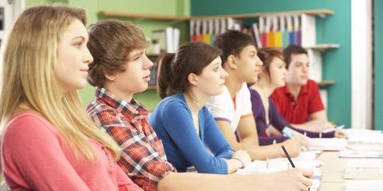 Students in class around square table