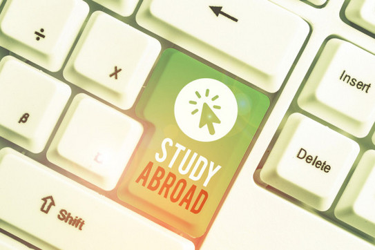 Keyboard Enter key with inscription "Study Abroad"