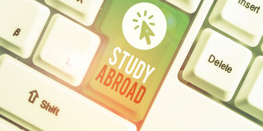 Keyboard Enter key with inscription "Study Abroad"